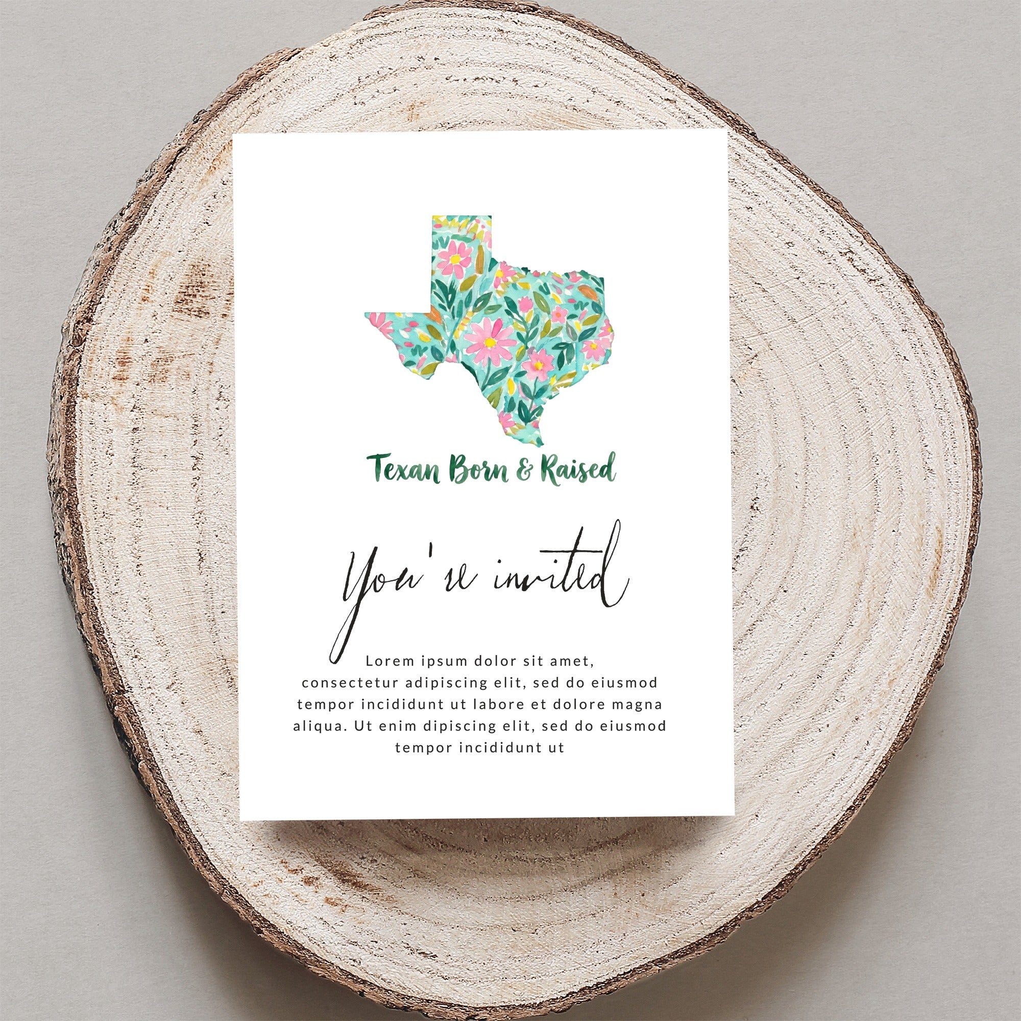 Invitation with Texas shape, floral pattern, and "Texan Born & Raised" text.