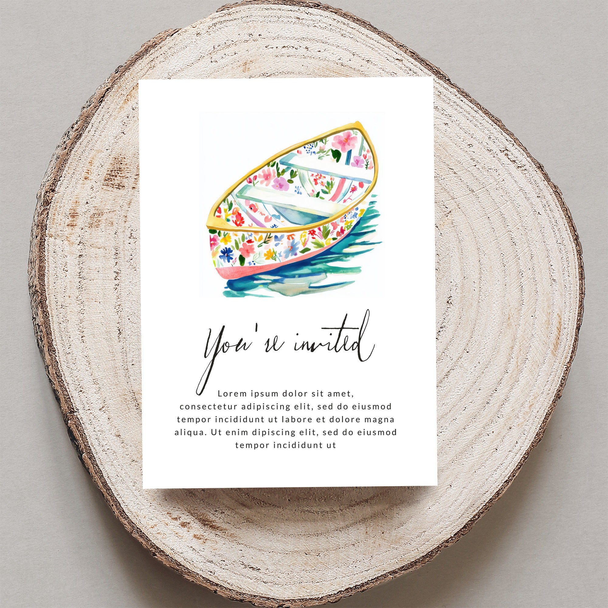 Floral rowboat invitation with "You're invited" text.