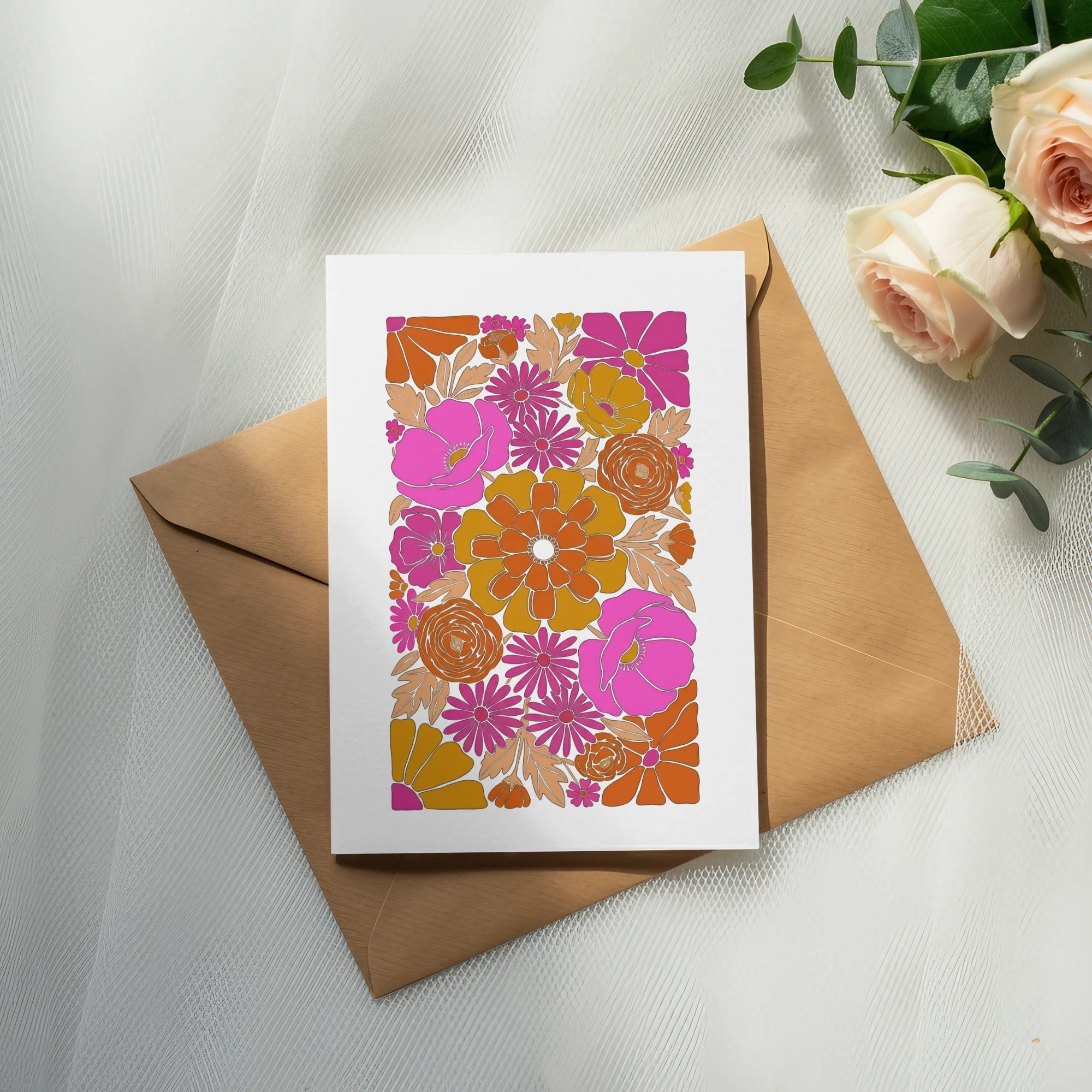 Card with retro floral pattern on a brown envelope with roses.