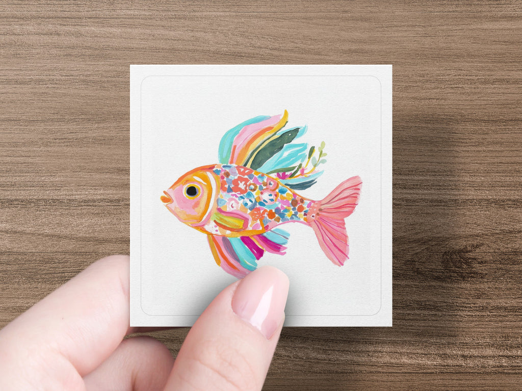 Square illustration of a colorful, stylized fish with floral accents.