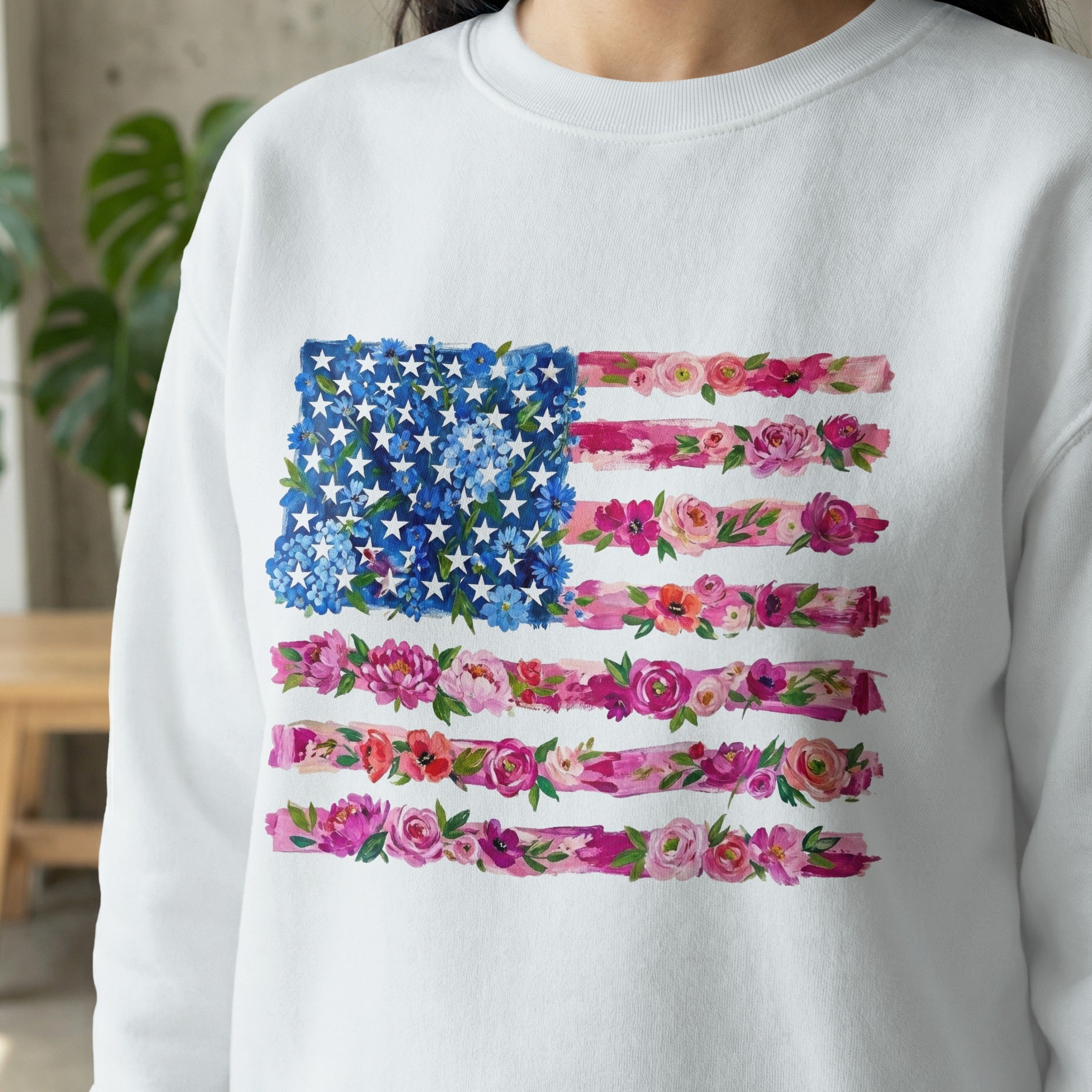 White sweatshirt with a floral American flag design.
