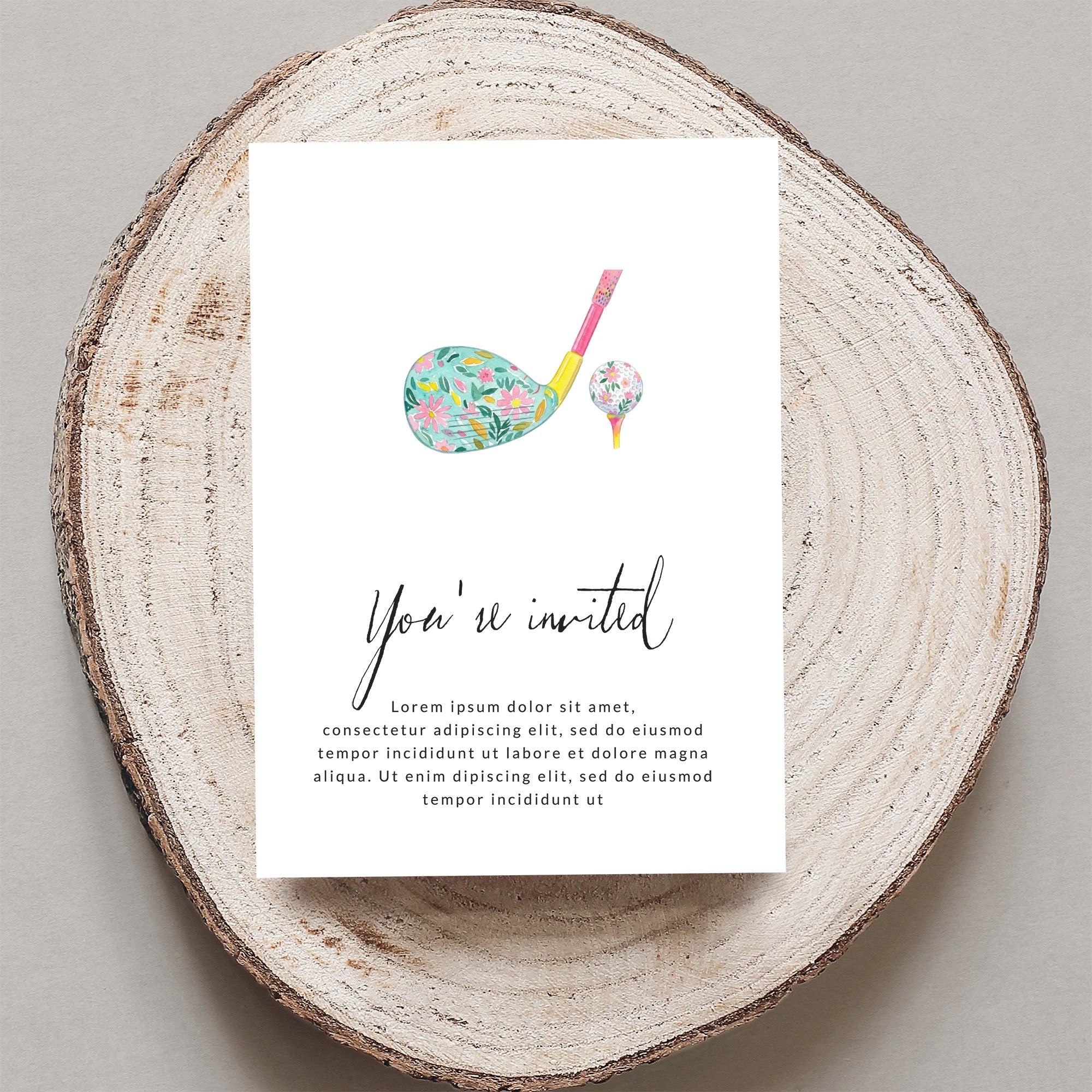 Golf invitation with floral golf club and ball design.