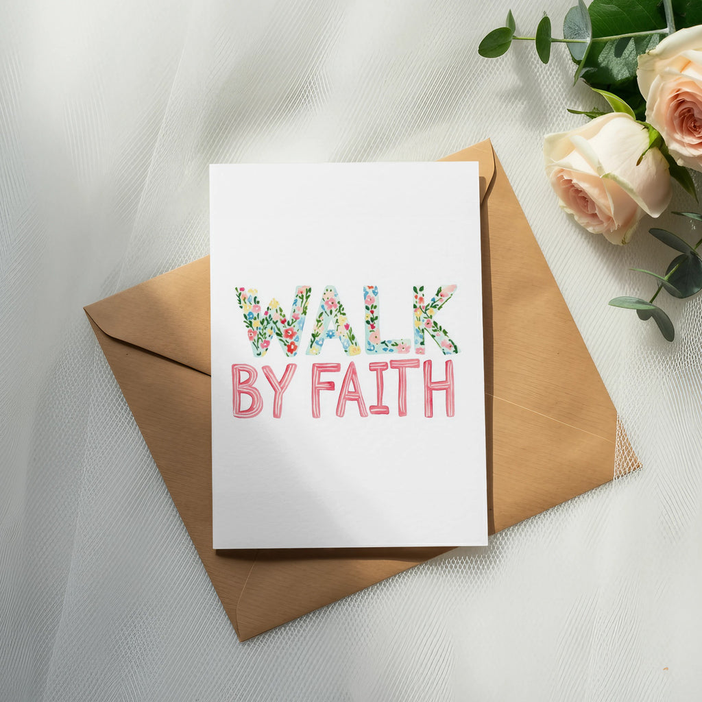 Card with floral "WALK BY FAITH" text on an envelope.