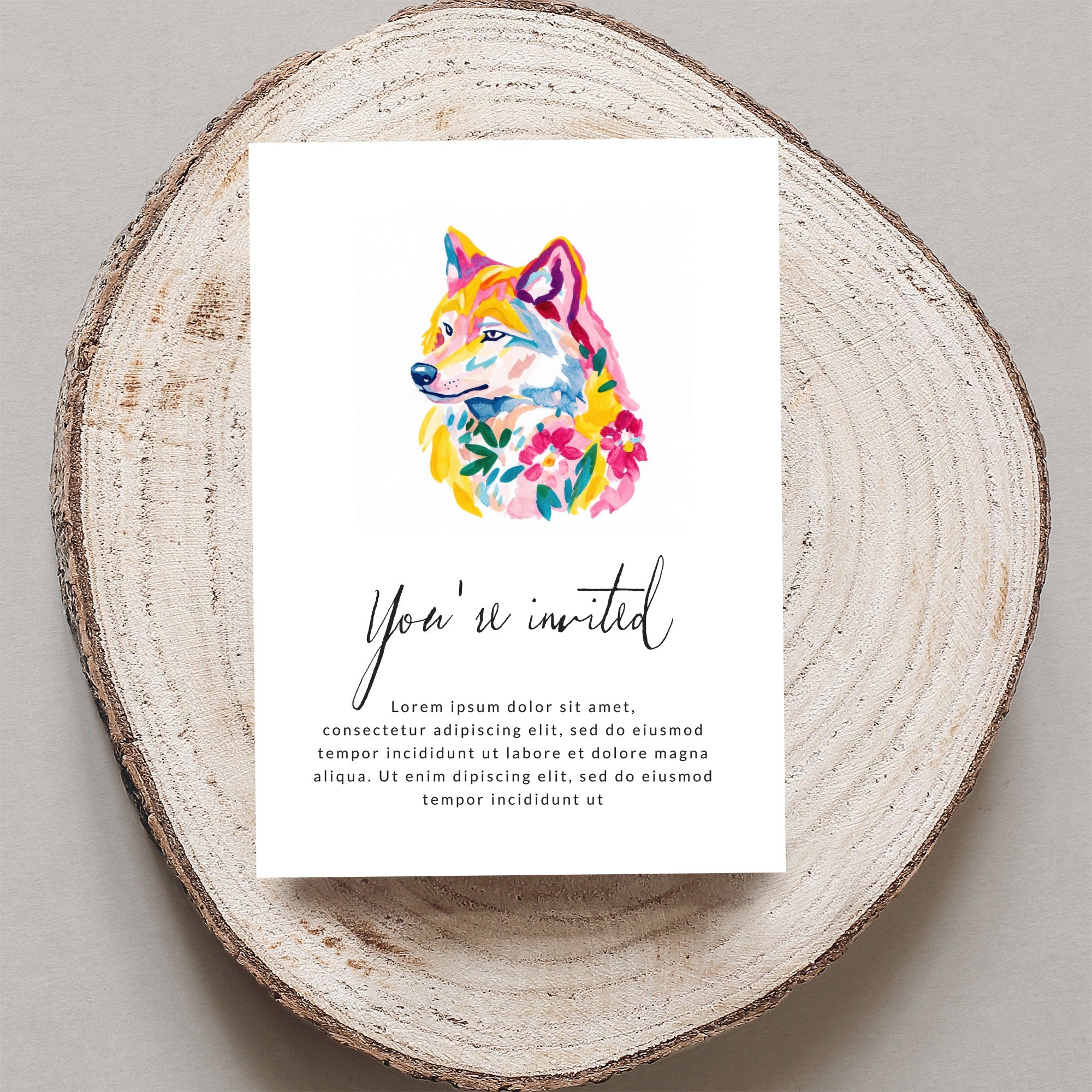 Watercolor wolf illustration with "You're invited" text on card.
