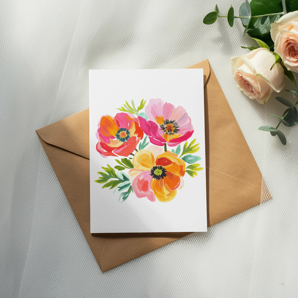 Card with a watercolor floral illustration on a brown envelope.