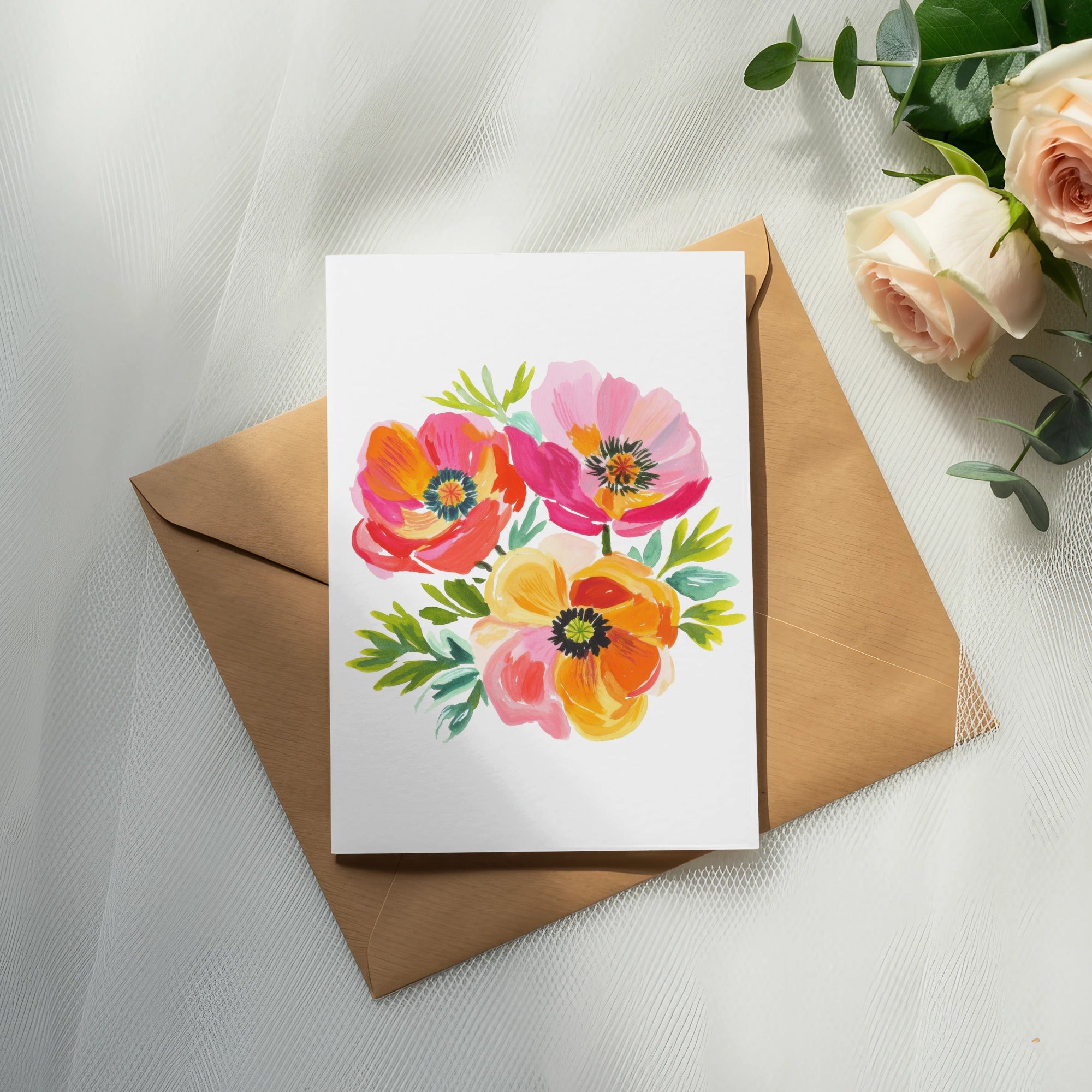 Card with a watercolor floral illustration on a brown envelope.