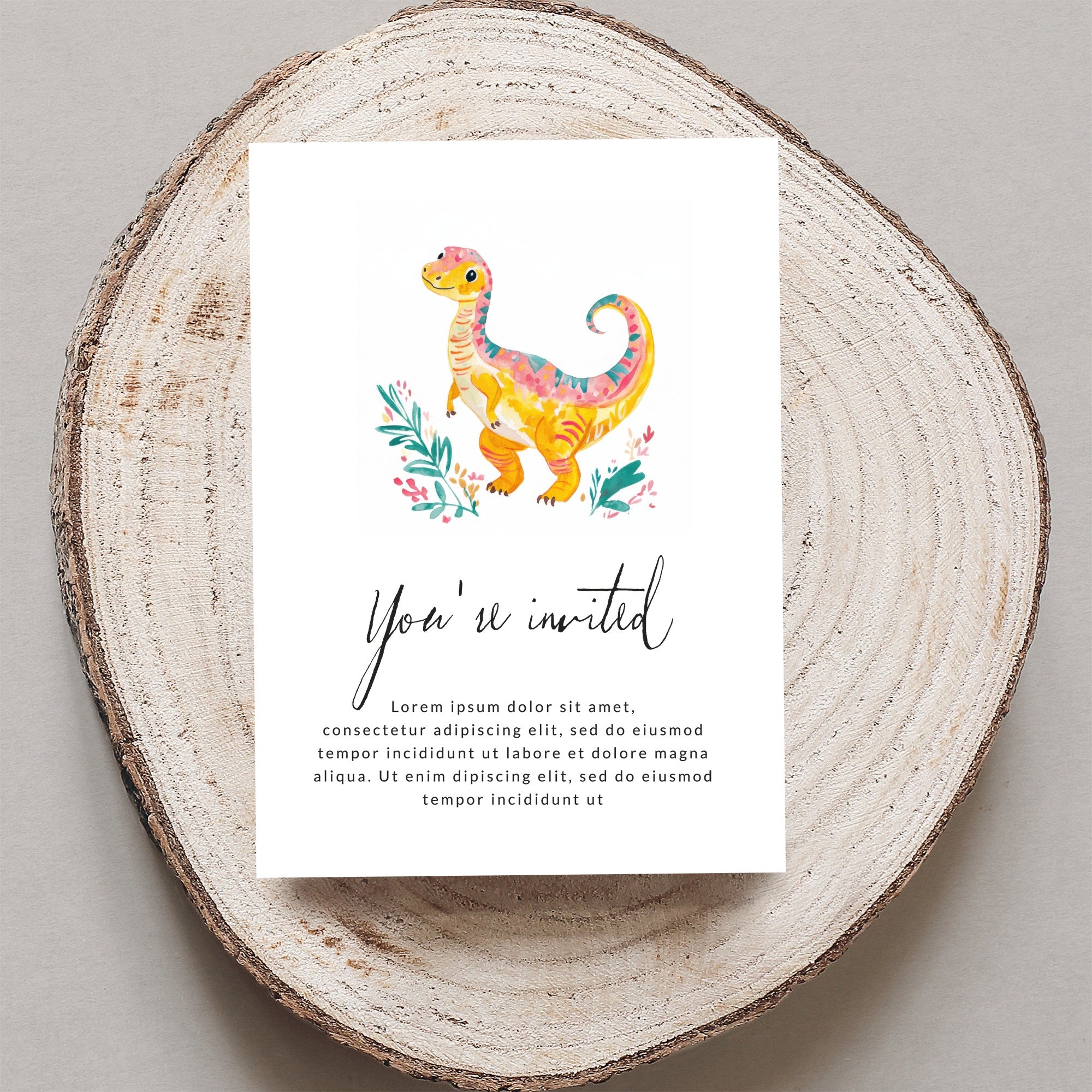 Invitation card with cartoon dinosaur and floral accents, featuring "You're invited" text.