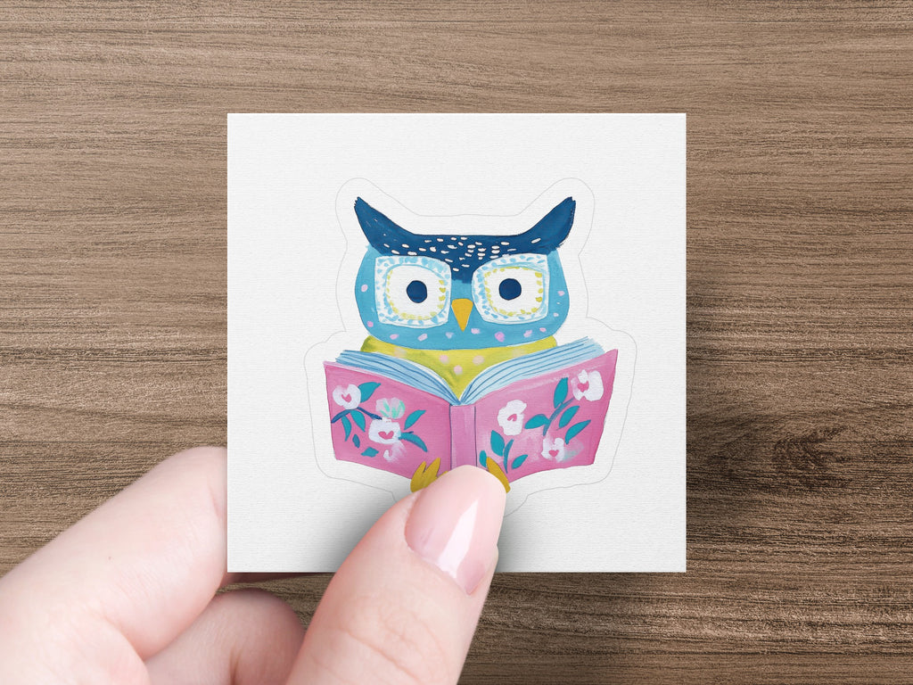 Illustration of a blue owl wearing glasses, reading an open pink book.