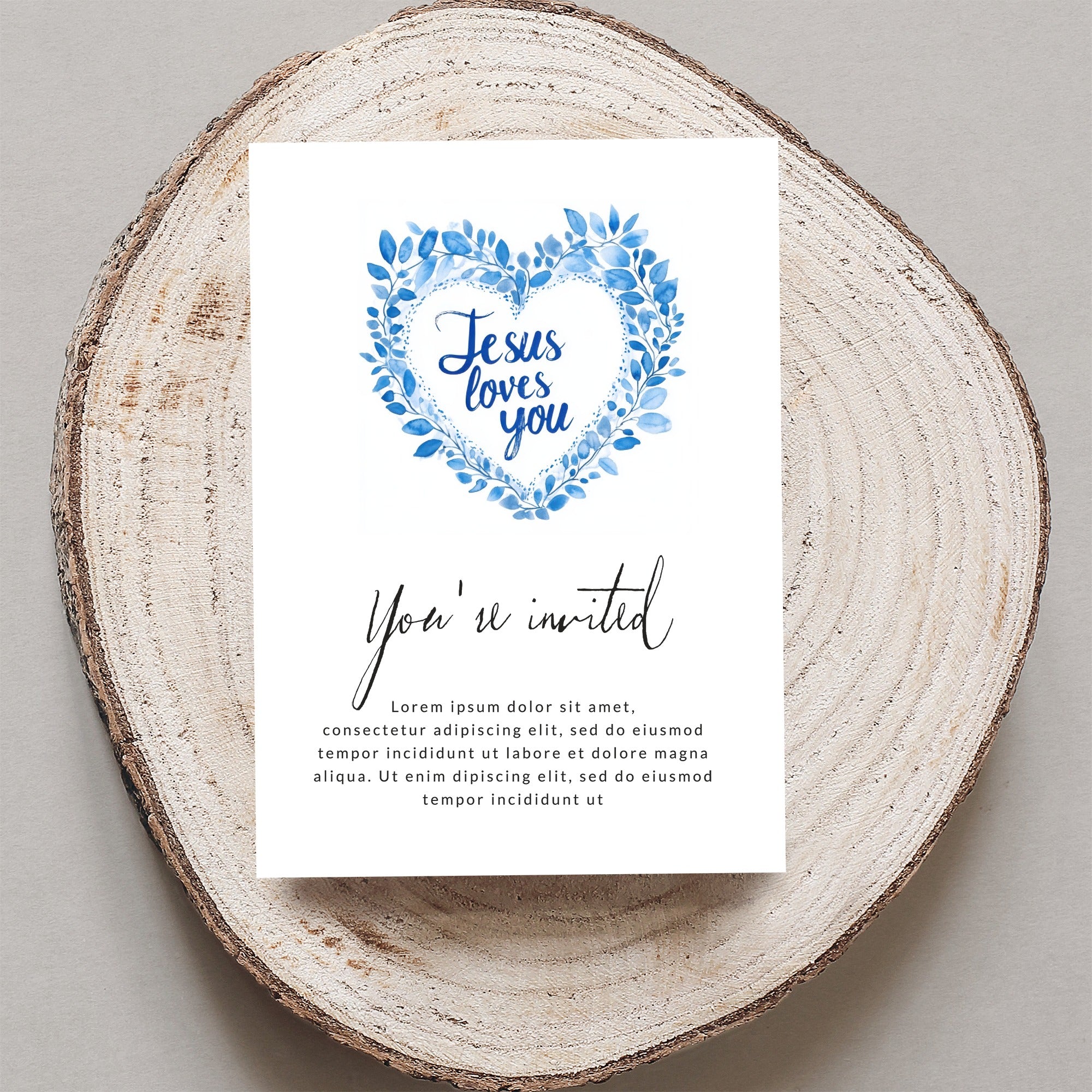 Invitation card with watercolor heart and "Jesus loves you" text.