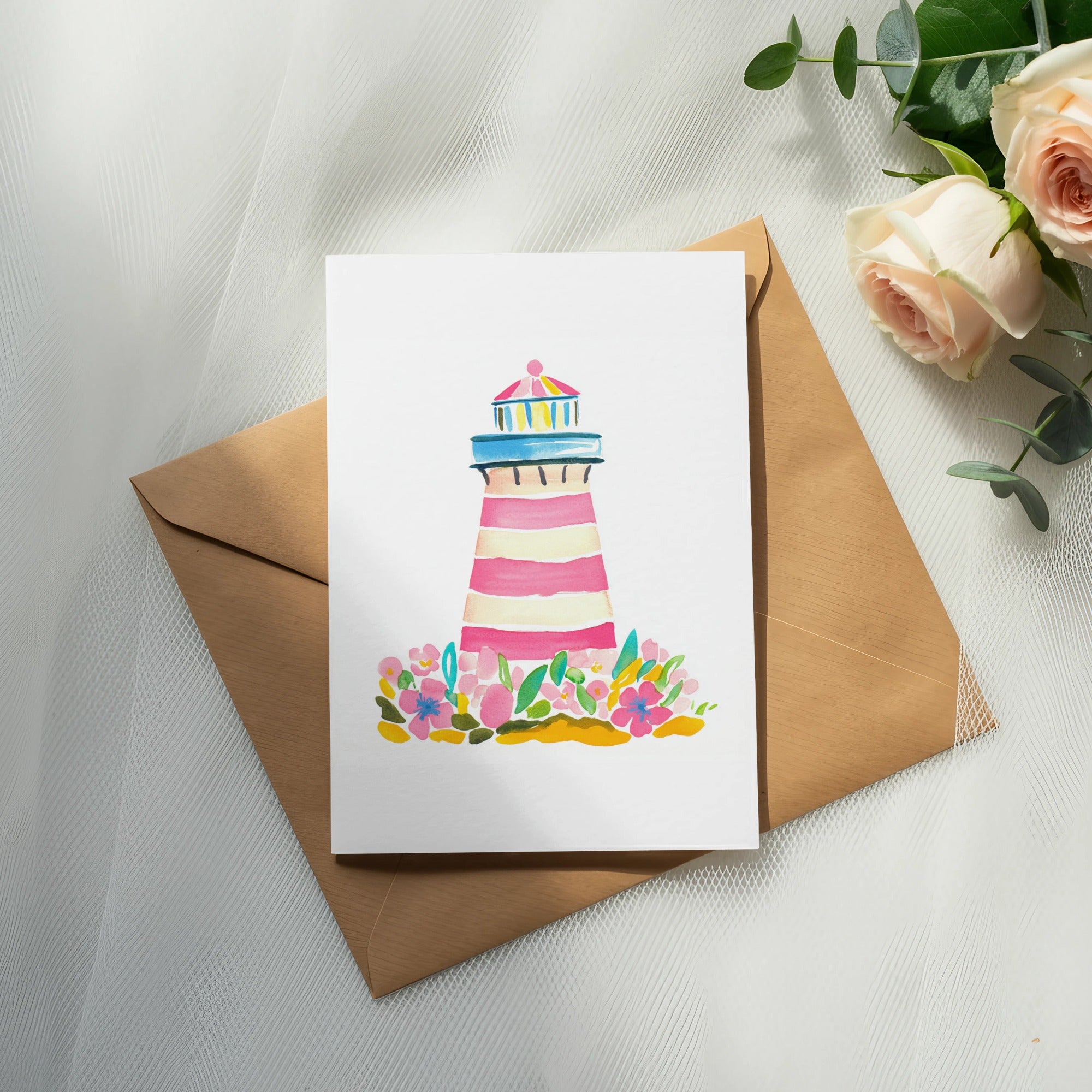 Watercolor lighthouse with pink stripes surrounded by flowers on a card.