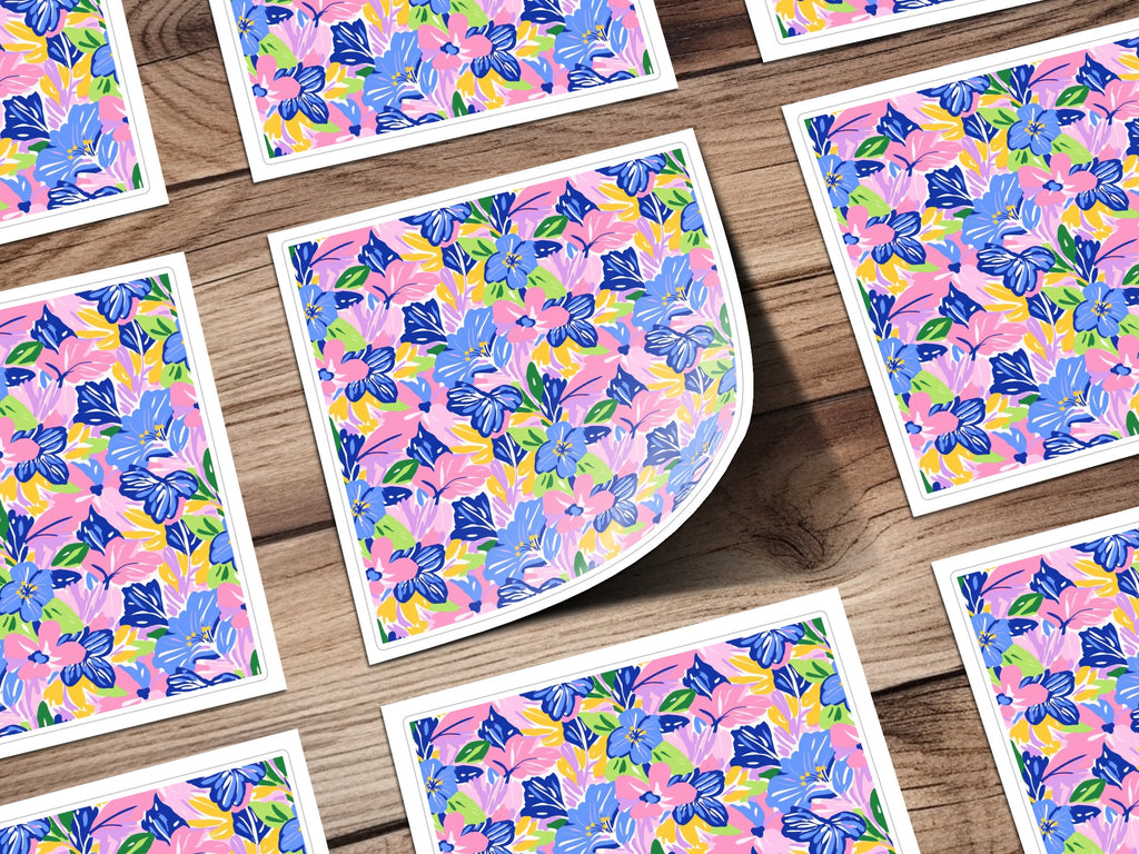 Floral pattern stickers on a wooden background.