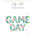 Watercolor "GAME DAY" text with floral details and pink and blue splatters.