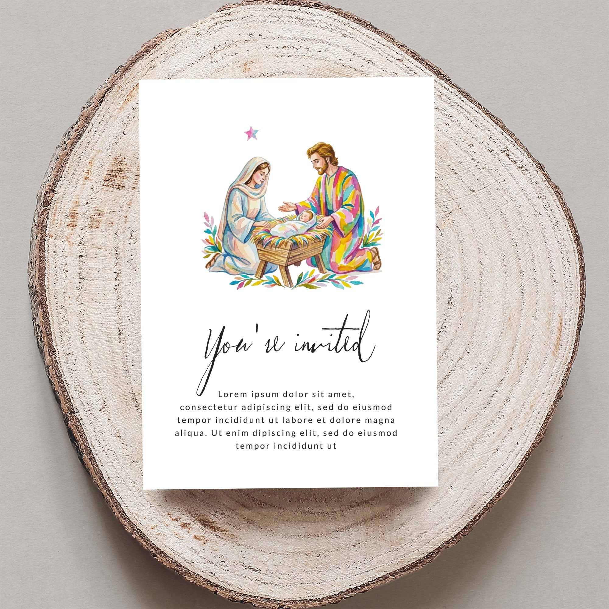 Nativity scene with "You're invited" and placeholder text on invitation.
