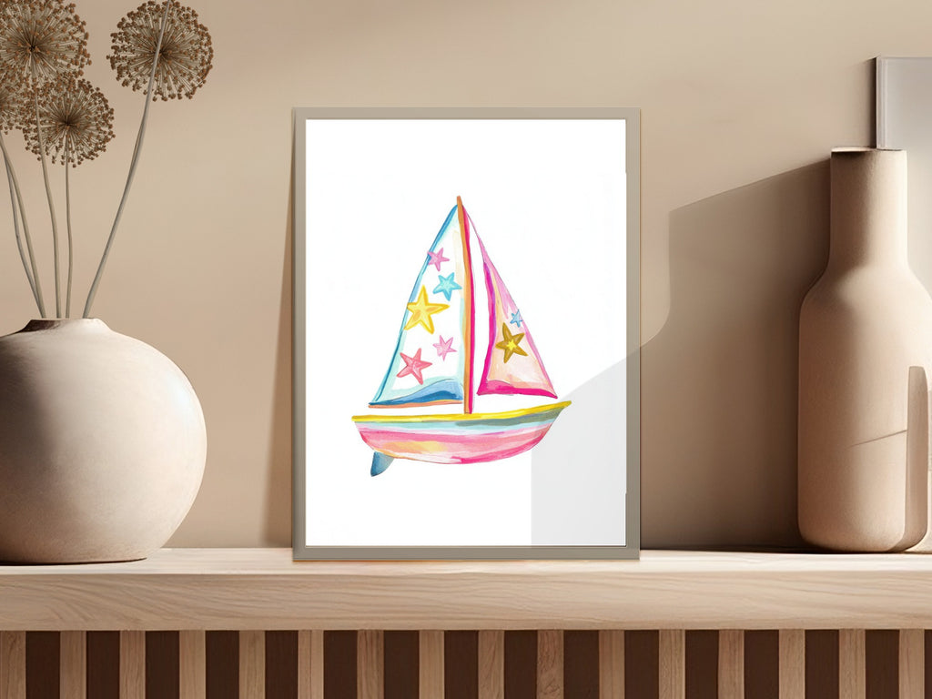 Watercolor illustration of a pink and blue sailboat with colorful star patterns.