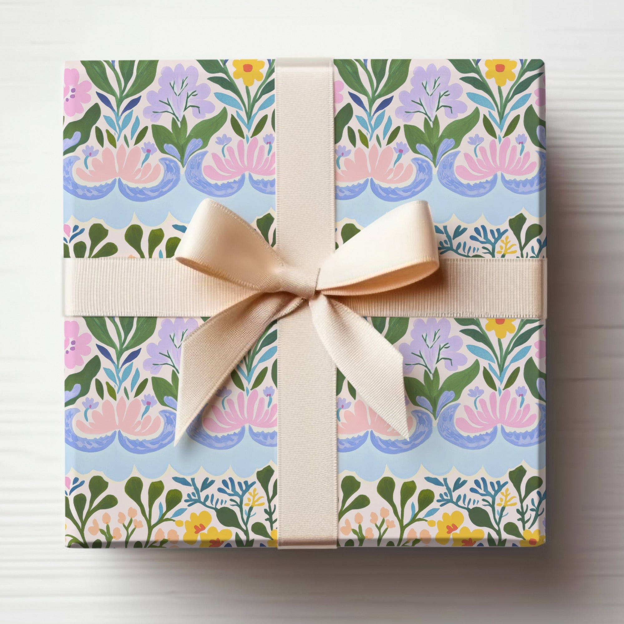 Floral Pattern Gift Wrap with Pink Ribbon for Any Occasion