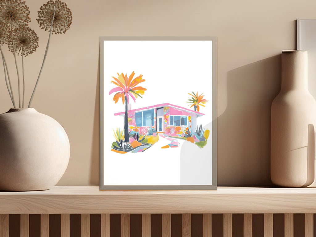 Watercolor painting of a pink mid-century modern house with palm trees.