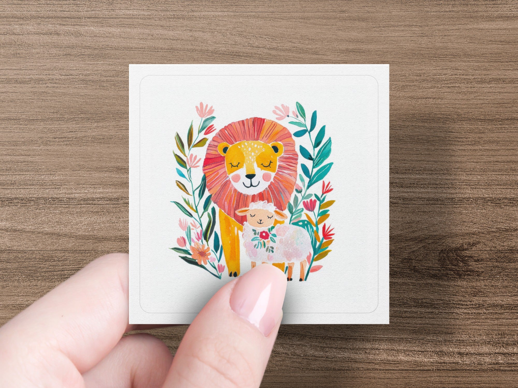 Lion and lamb illustration surrounded by flowers and leaves.