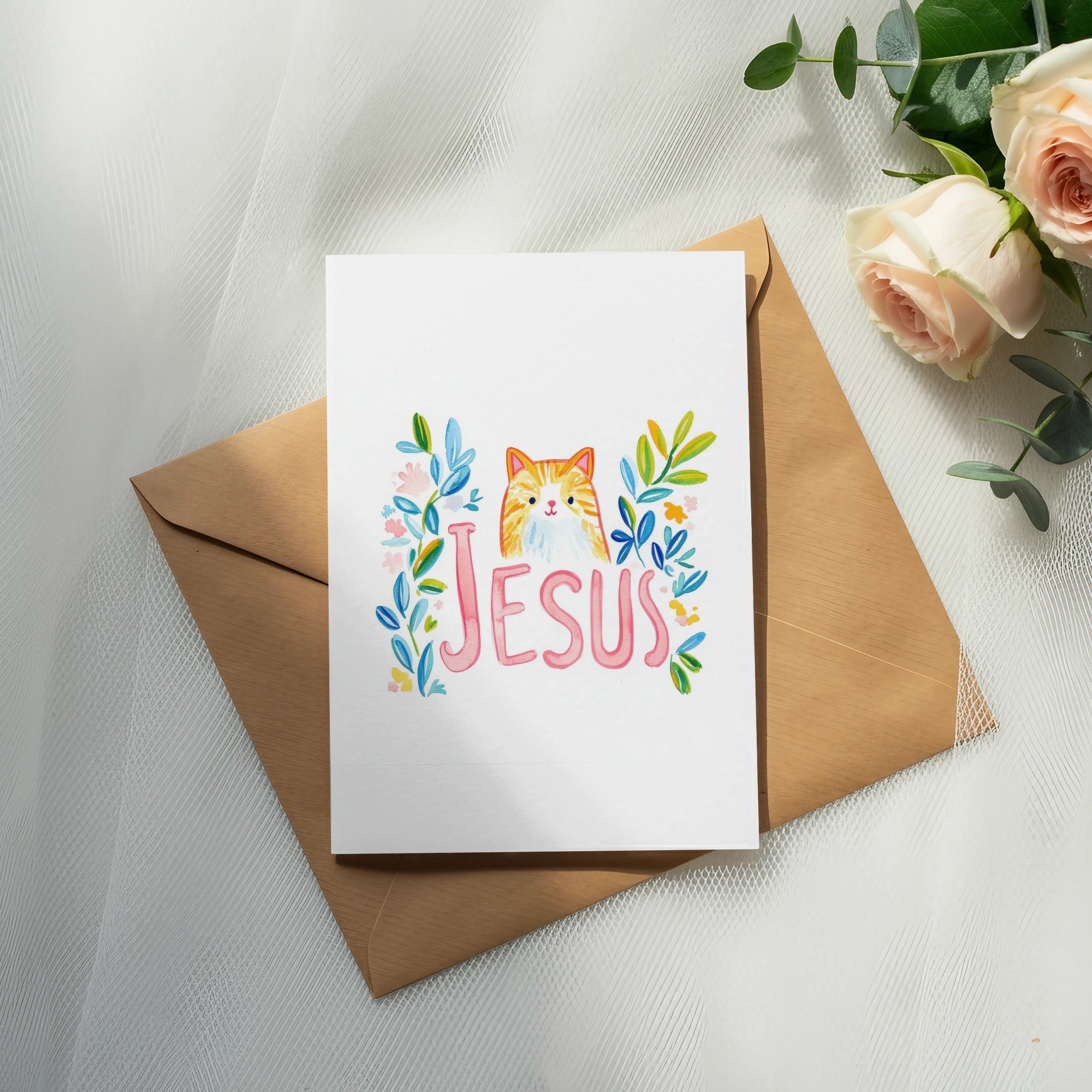 Card with the word "JESUS" in pink lettering, surrounded by watercolor flowers and a cat.