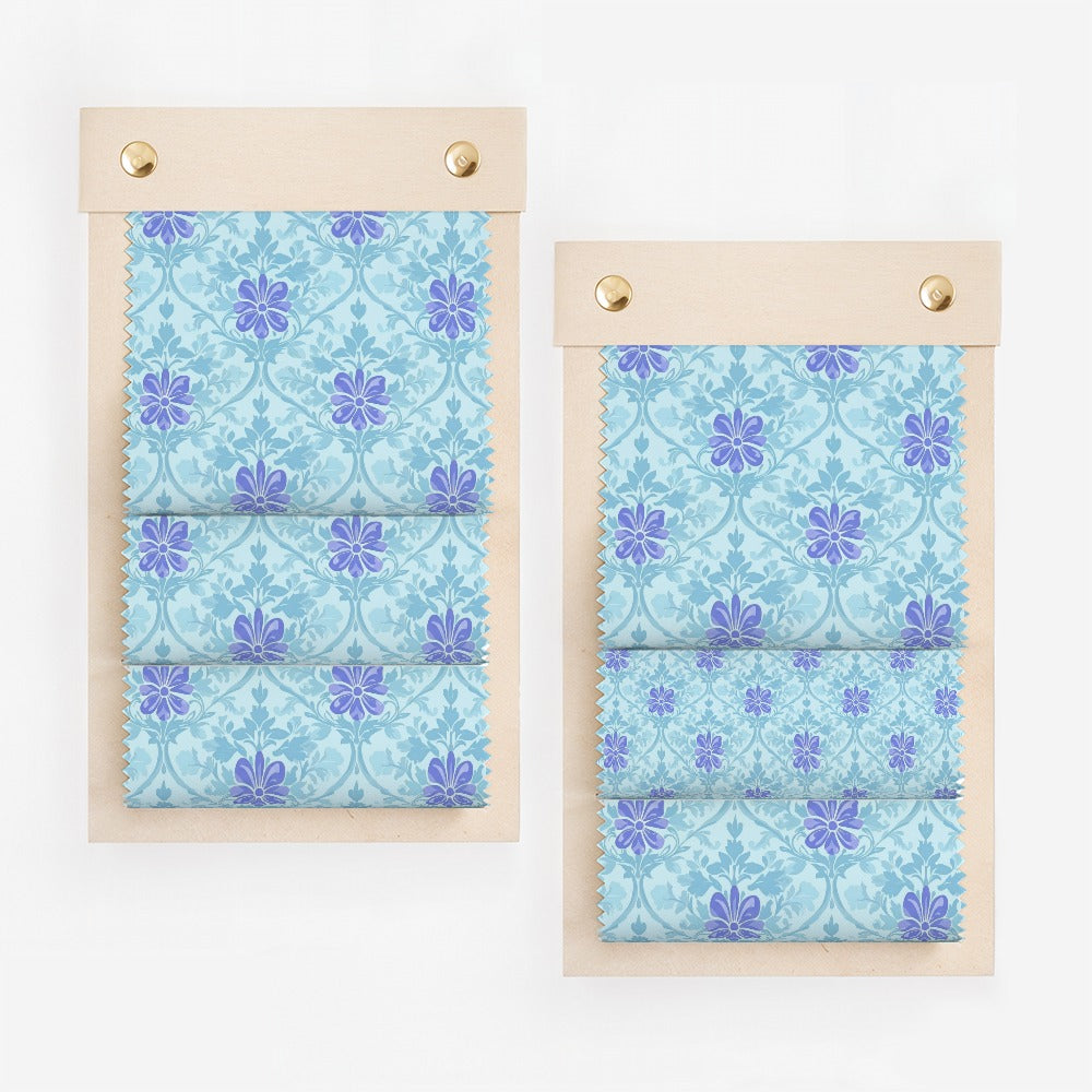 Floral fabric swatches on wooden boards.