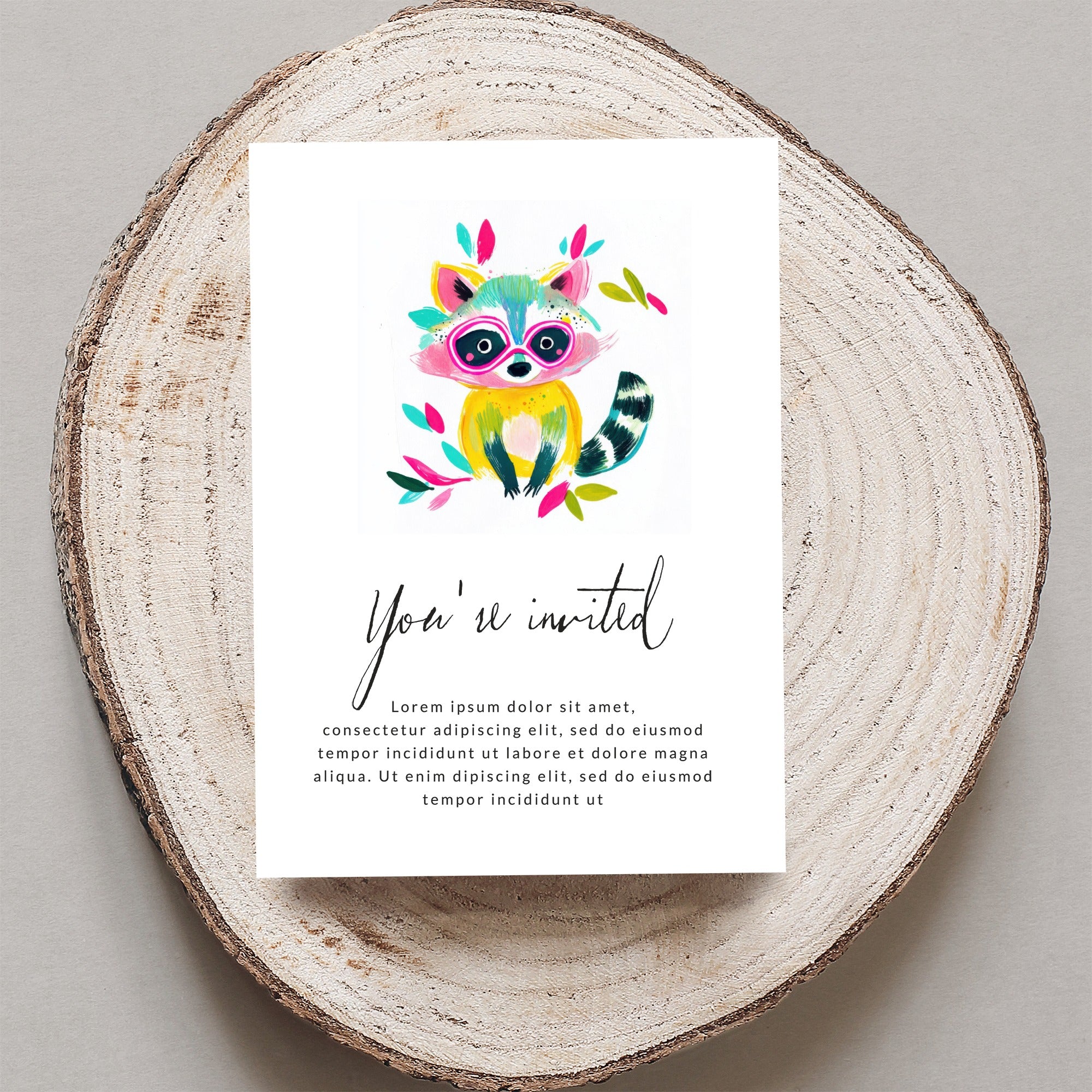 Whimsical raccoon illustration on invitation: "You're invited" and placeholder text.