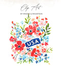 Floral arrangement with red, white, and blue flowers and "USA" text.