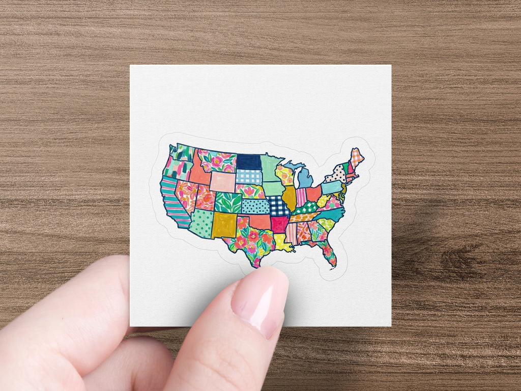United States map sticker with colorful floral and geometric patchwork pattern.