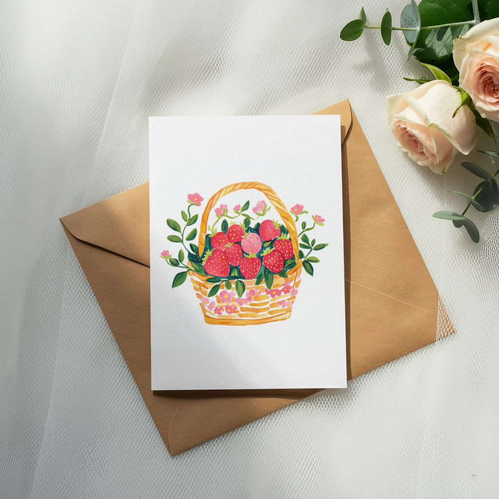 Watercolor illustration of a basket overflowing with strawberries and pink flowers.
