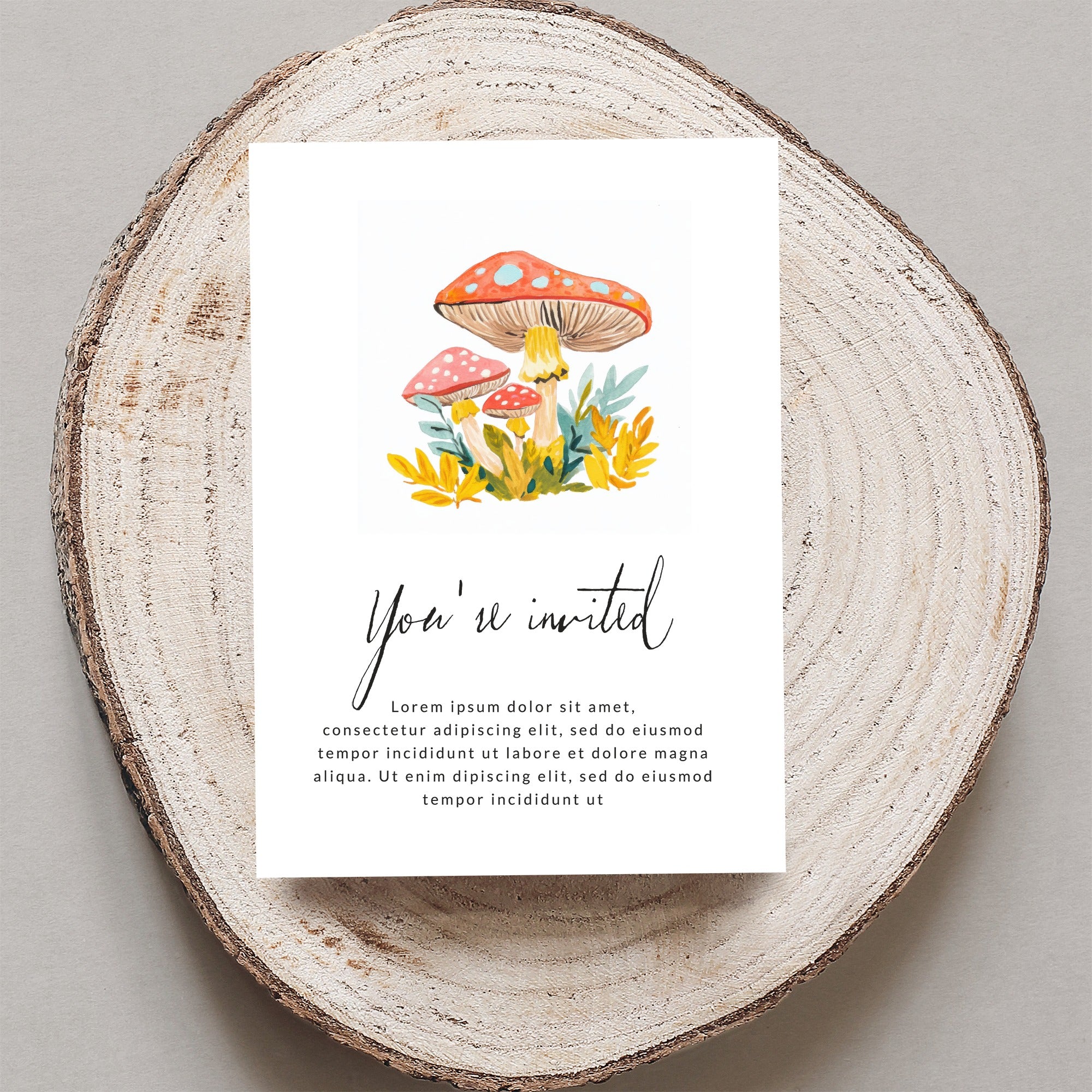 Invitation with watercolor mushrooms and "You're invited" text.