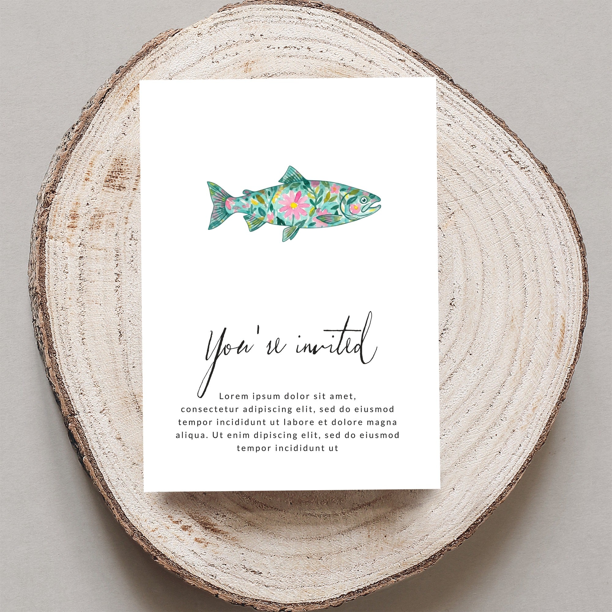 Invitation with floral fish illustration and placeholder text.