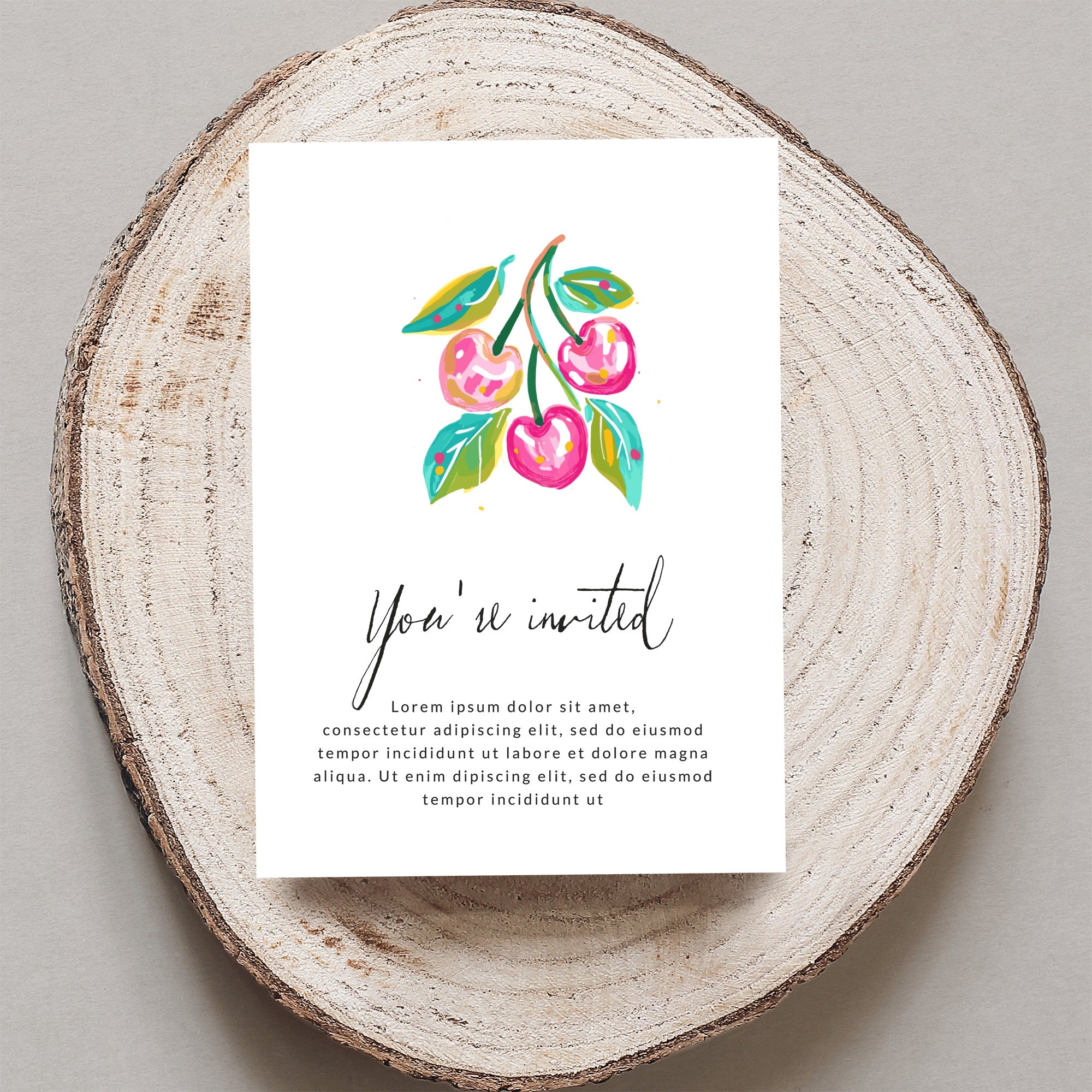 Invitation card with watercolor cherries and "You're invited" text.