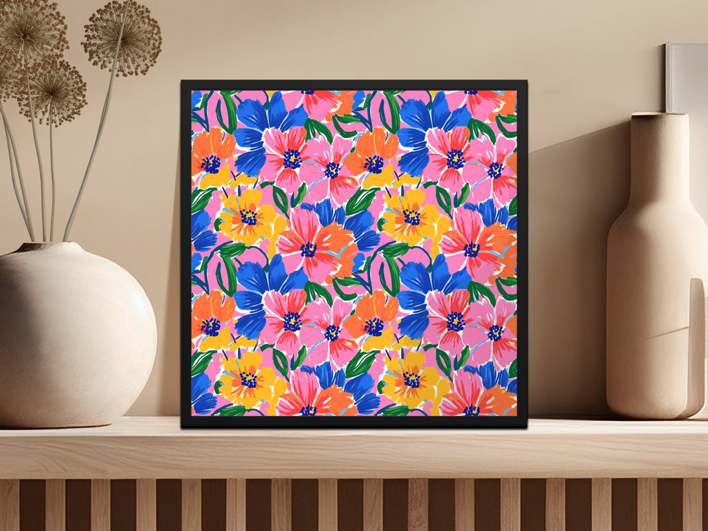 Floral art print with pink, blue, and yellow flowers in a black frame.