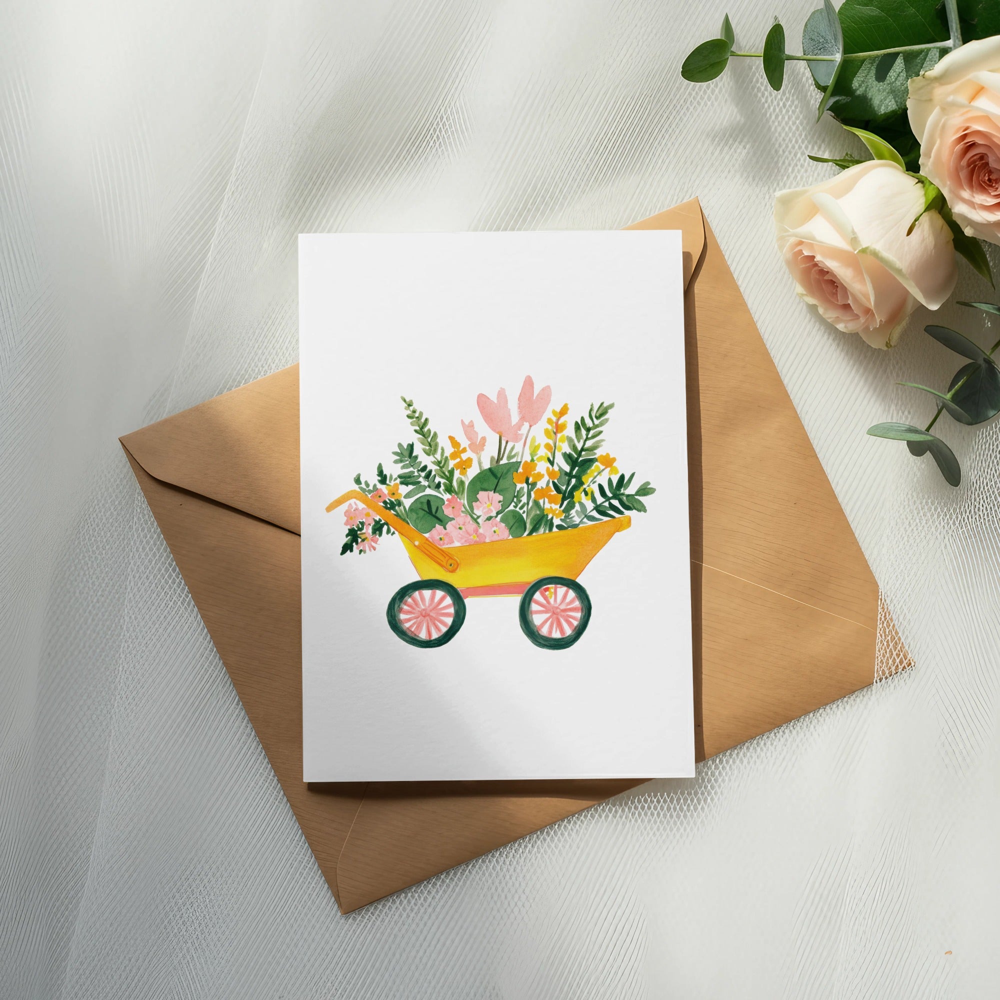 Watercolor painting of a yellow wheelbarrow filled with flowers on a card.