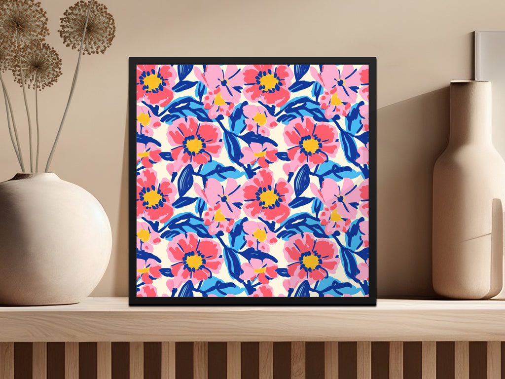 Framed floral art with pink and blue flowers on a cream background.