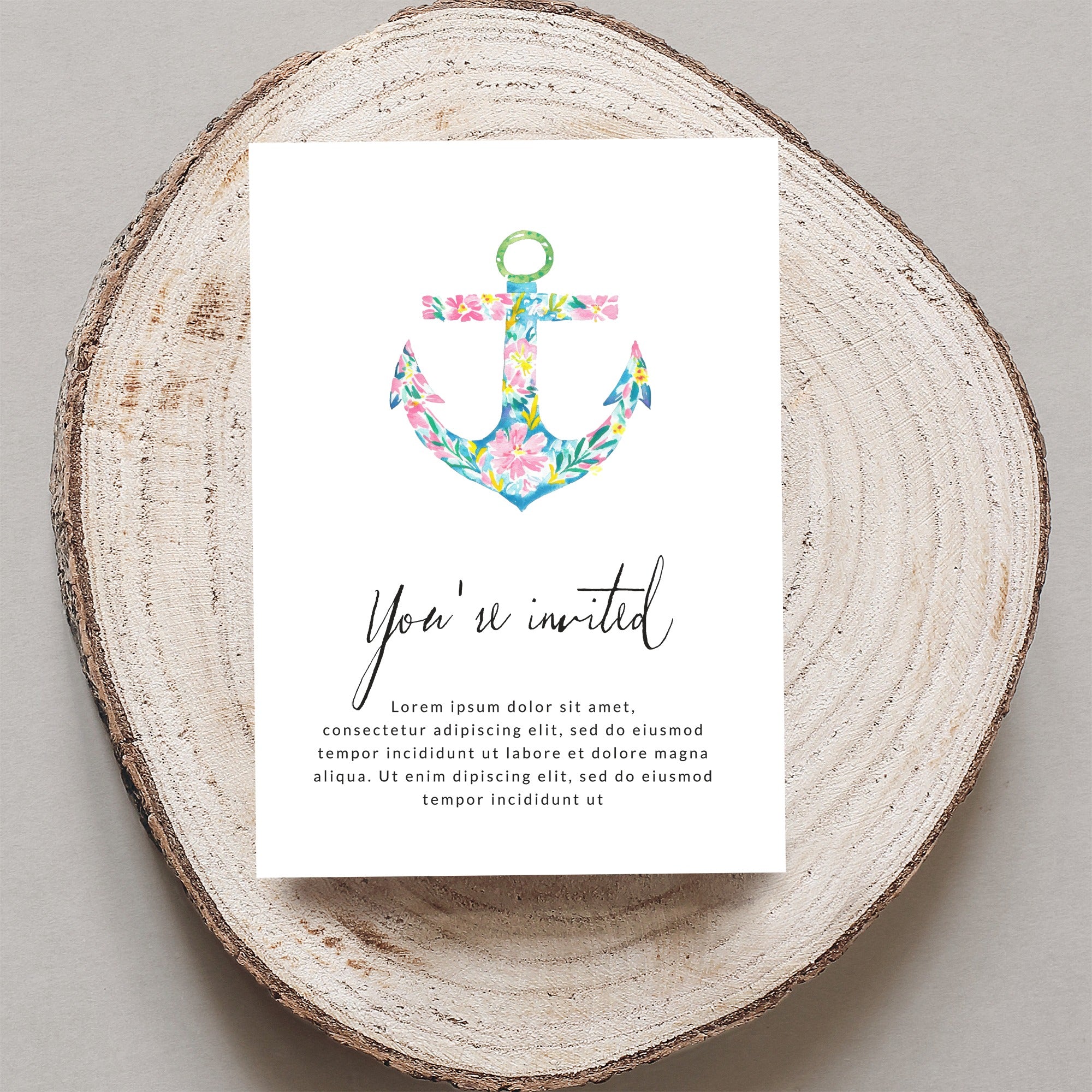 Invitation card with floral anchor illustration and "You're invited" text.