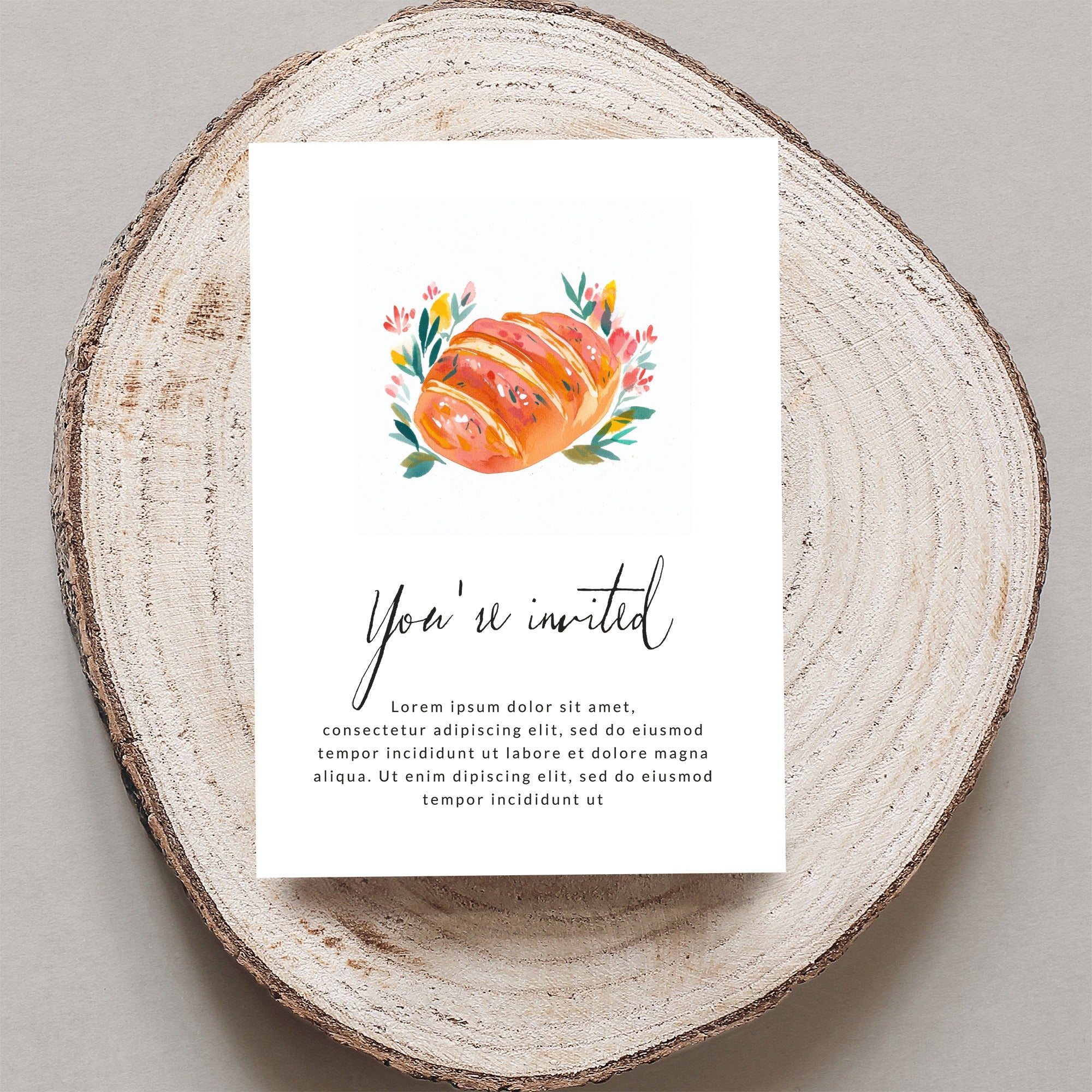 Invitation card with watercolor bread illustration and "You're invited" text.