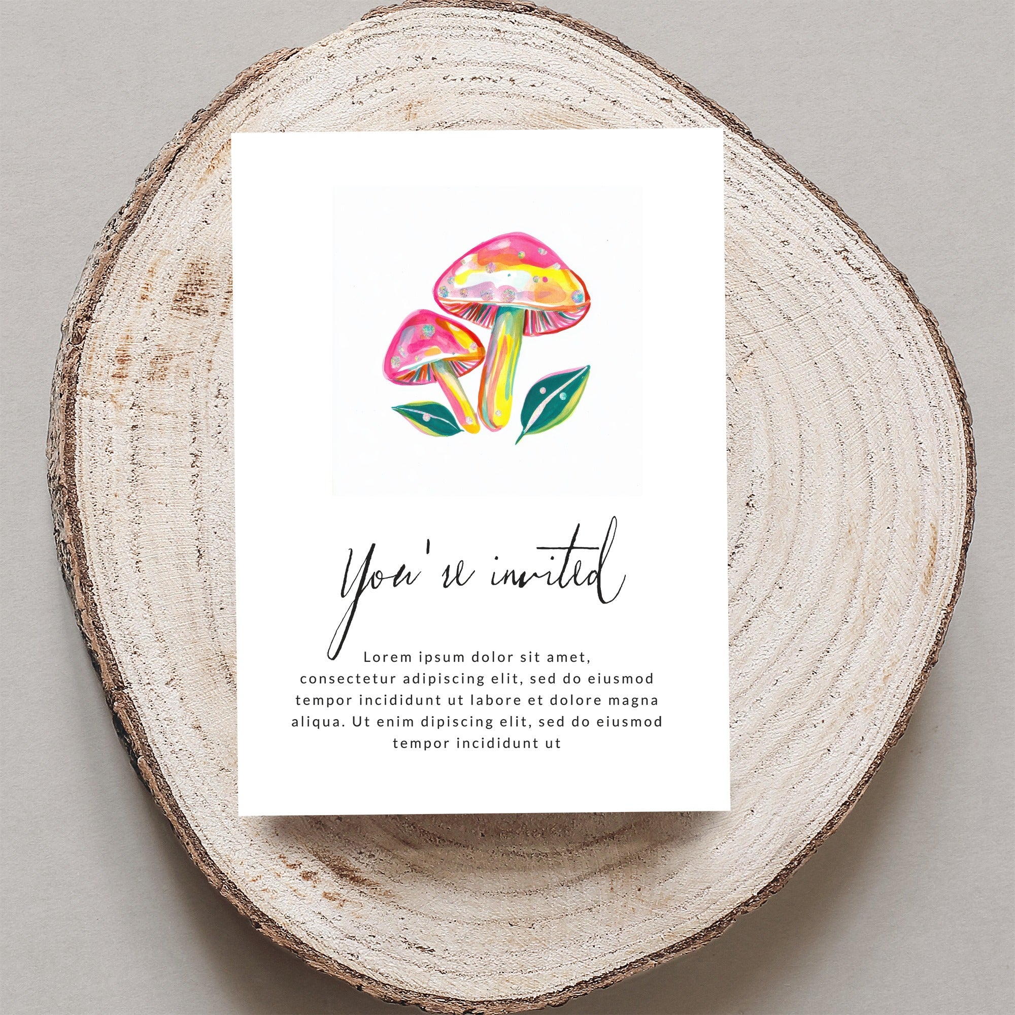 Invitation with watercolor mushrooms and "You're invited" text.