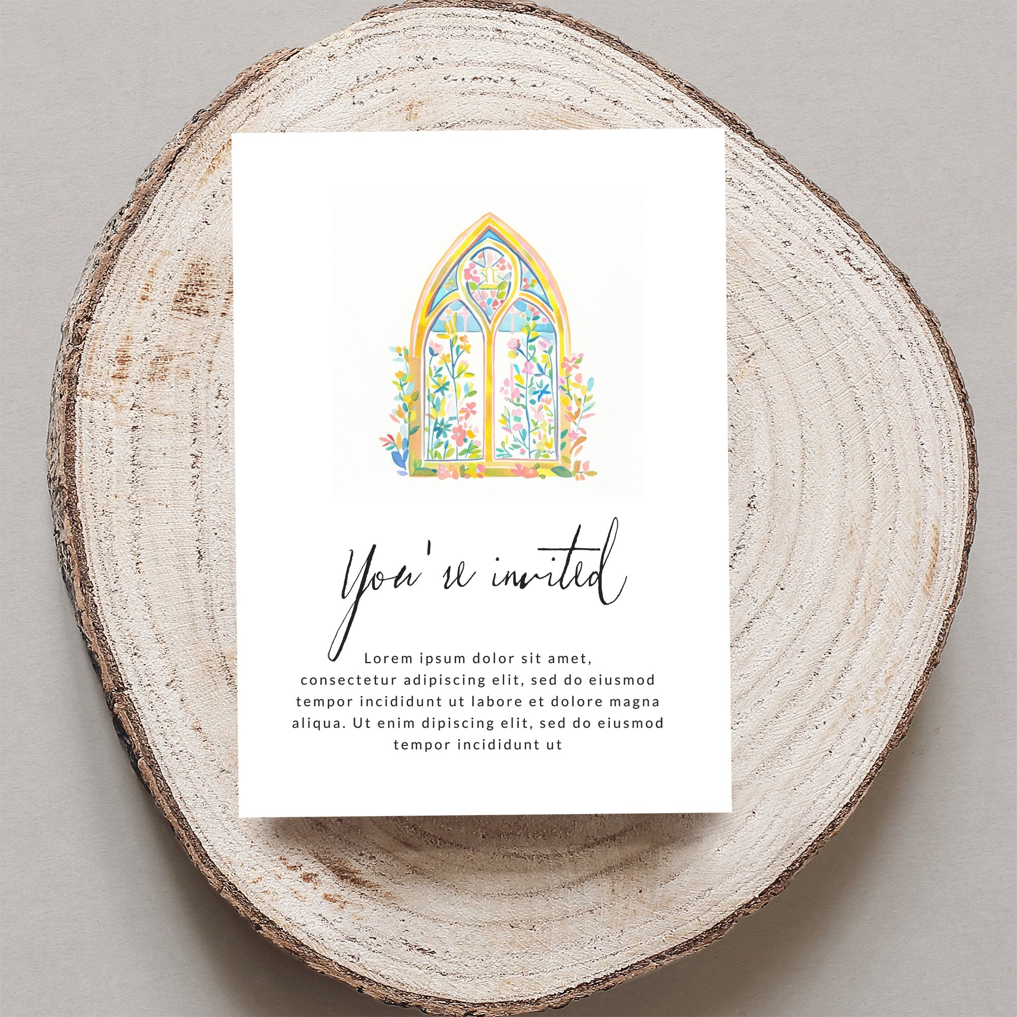 Invitation with watercolor stained glass window and calligraphy.