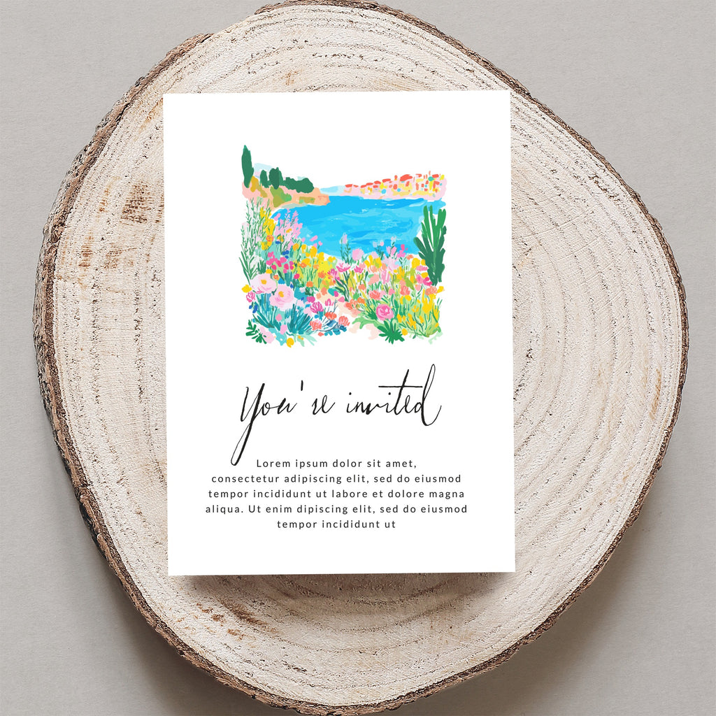Watercolor invitation card with "You're invited" and floral seaside scene.