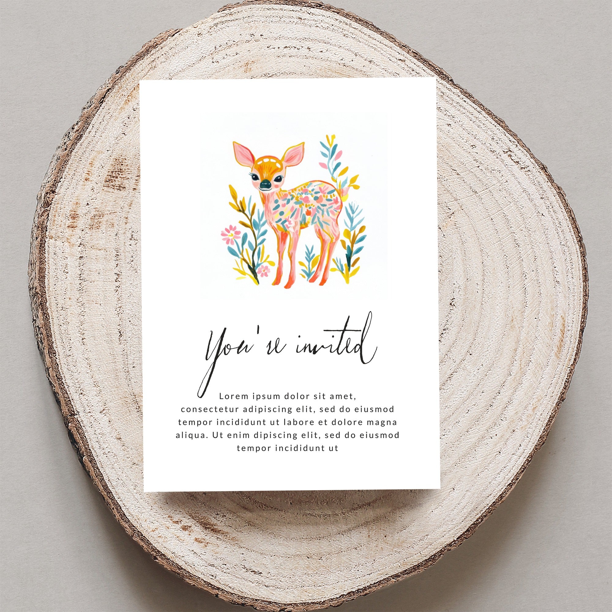 Invitation card with a watercolor deer illustration and "You're invited" text.