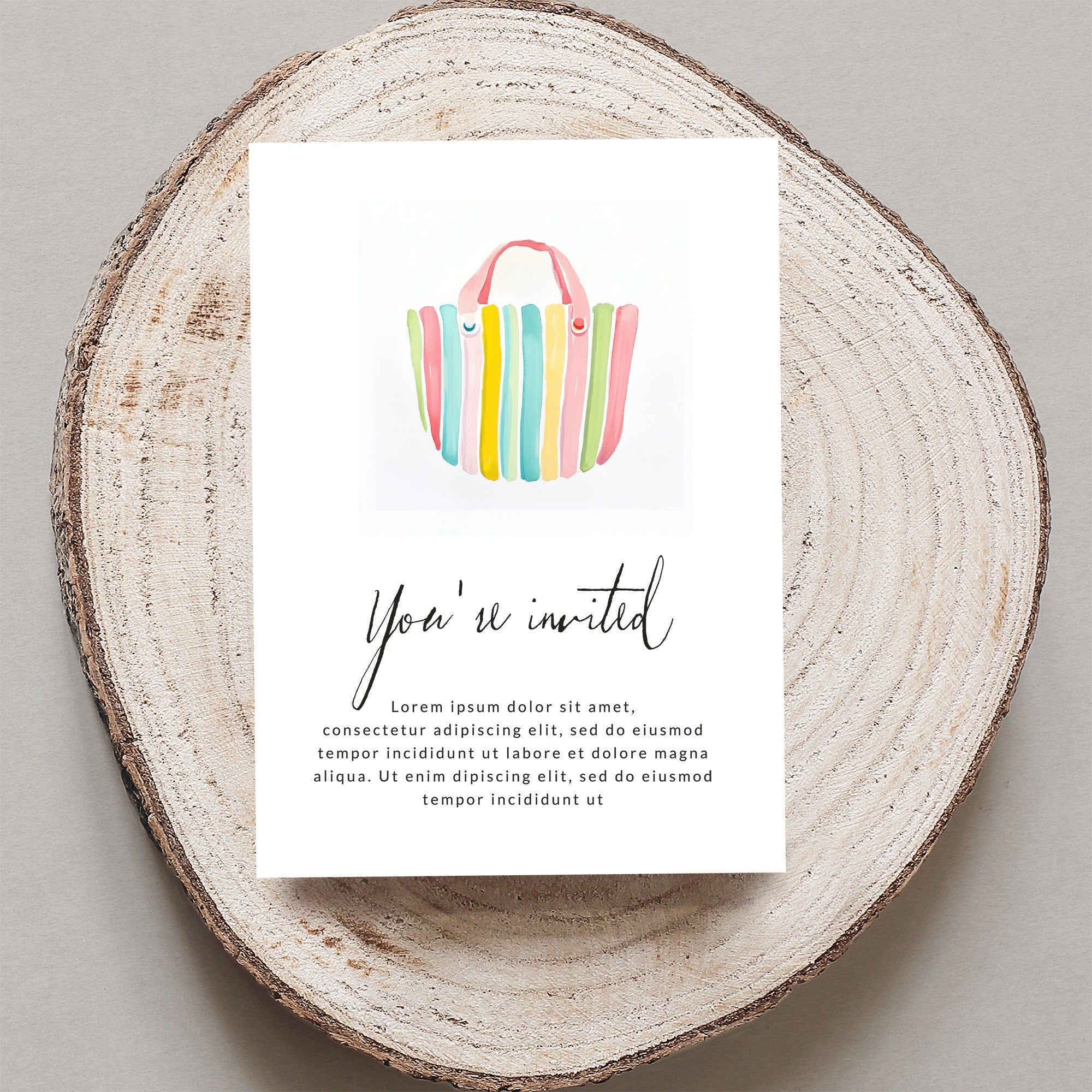 Invitation card with watercolor bag and "You're invited" text.