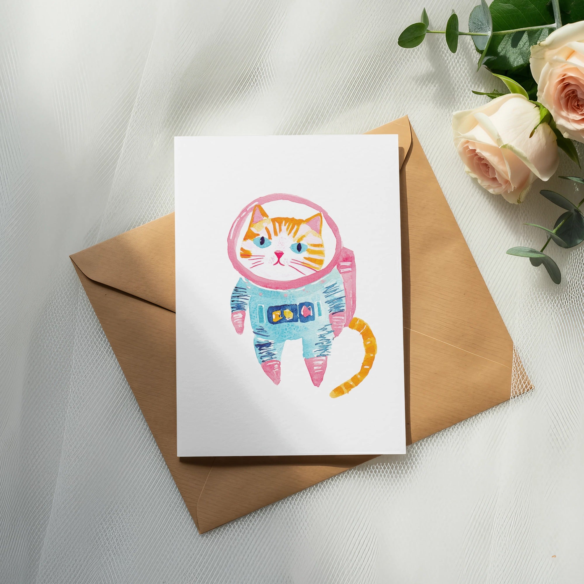 Watercolor illustration of a cat in a pink and blue spacesuit on a card.