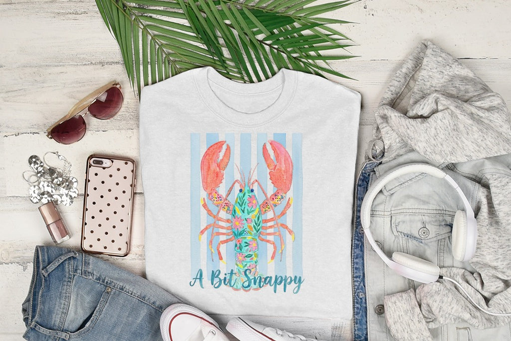 White t-shirt with blue stripes and a colorful lobster graphic.