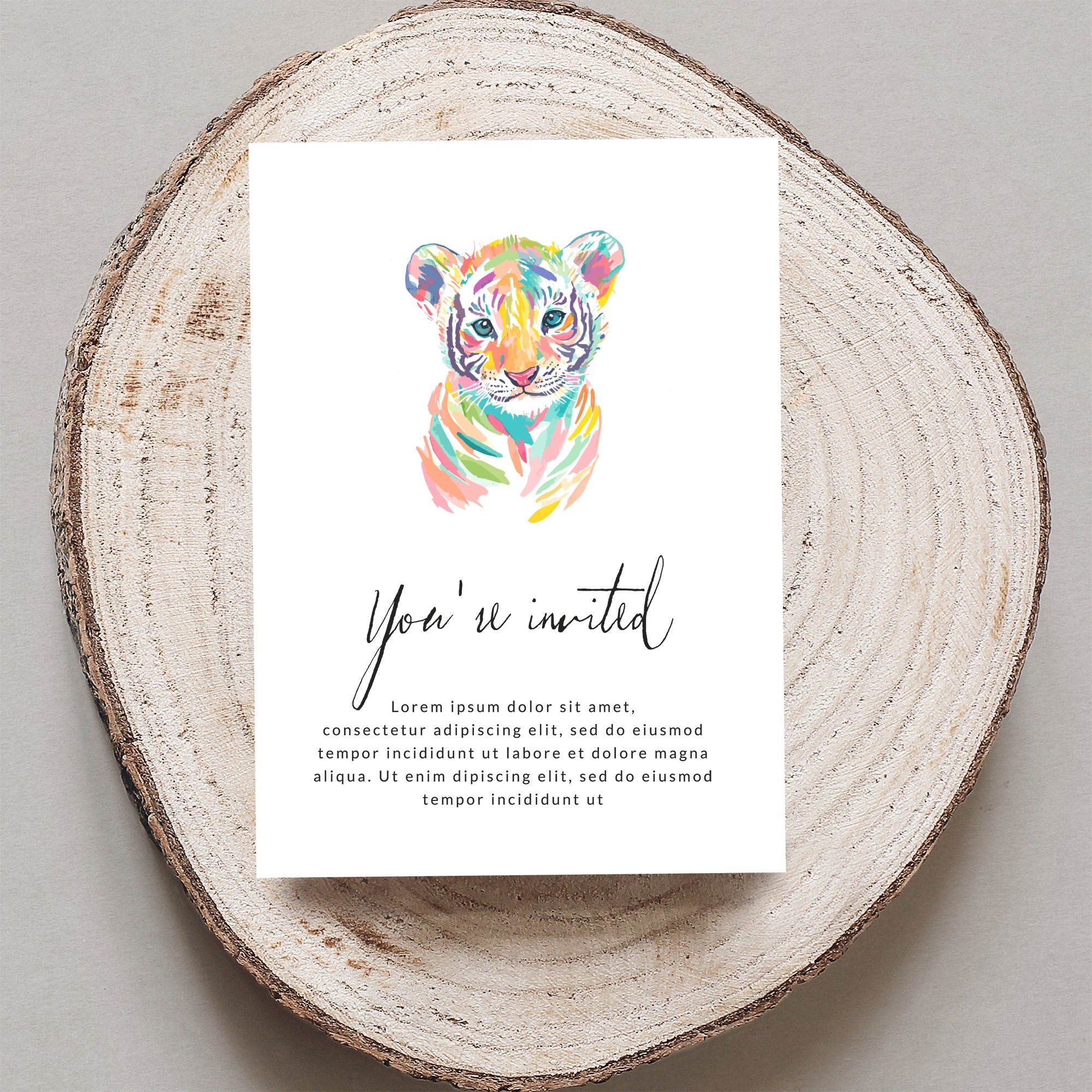 Colorful tiger cub invitation with "You're invited" text.
