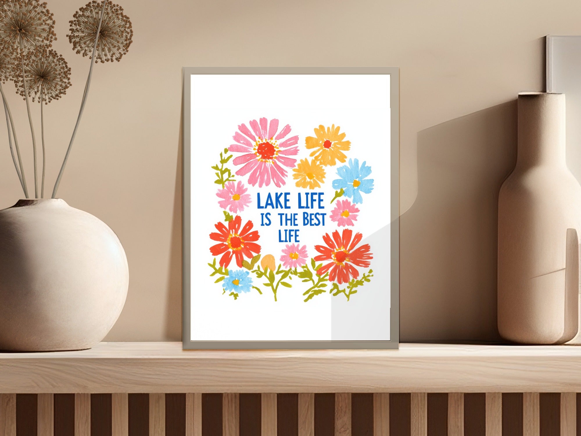 Floral art print with text "Lake life is the best life".