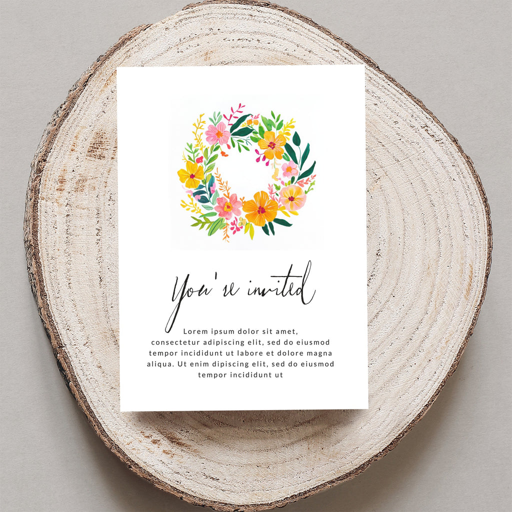 Invitation with floral wreath and "You're invited" text.