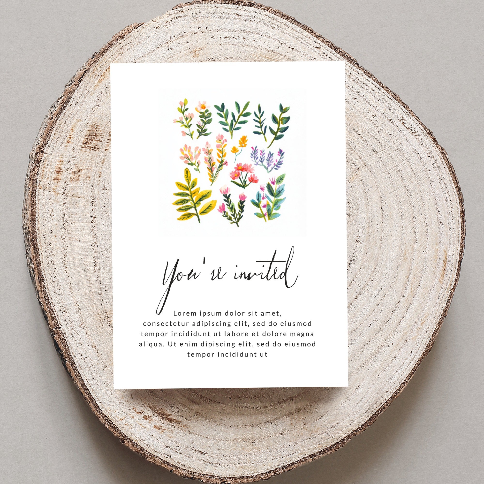 Invitation card with floral illustrations and "You're invited" text.