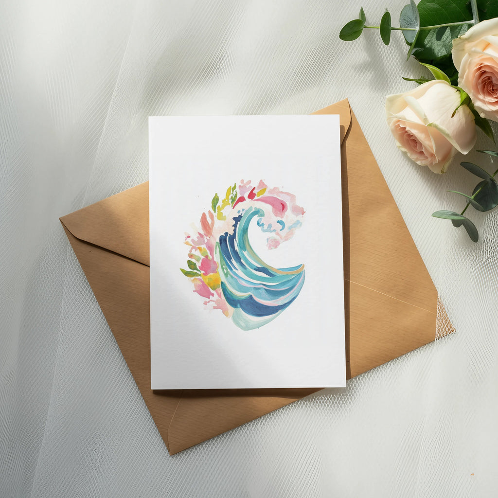 Watercolor painting of a stylized ocean wave with floral accents on a card.