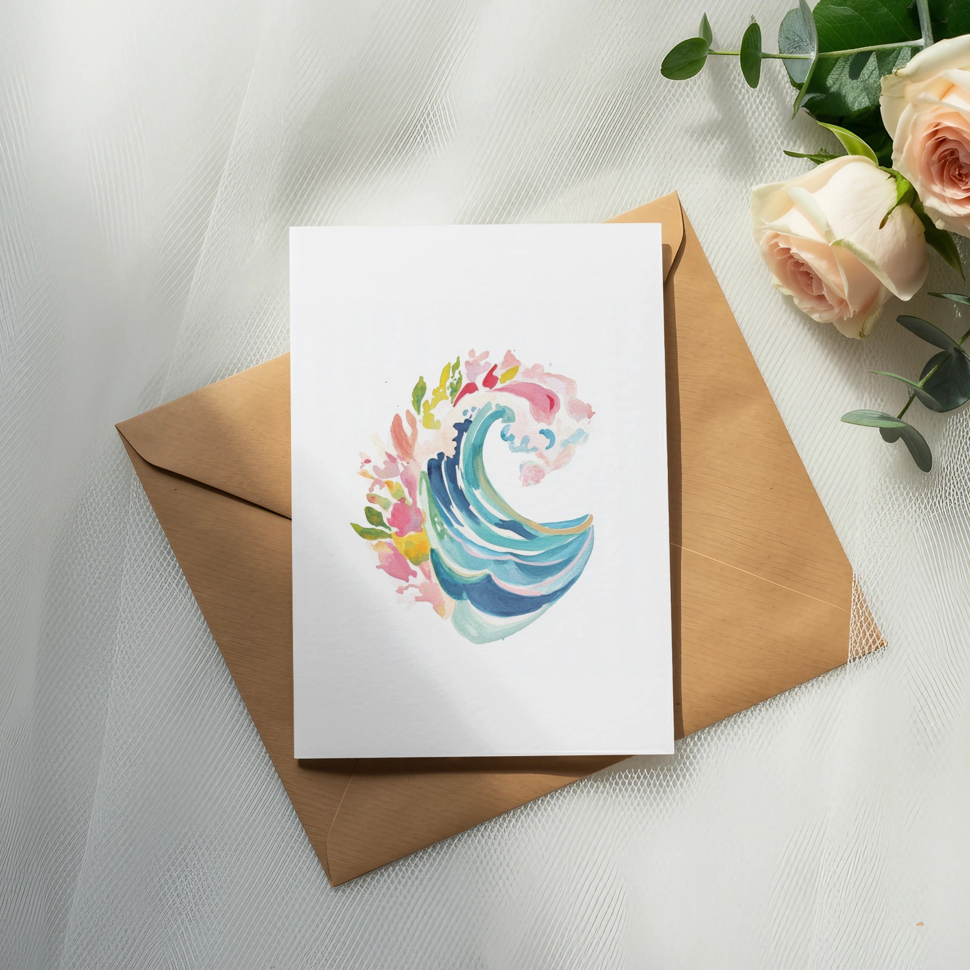 Watercolor painting of a stylized ocean wave with floral accents on a card.