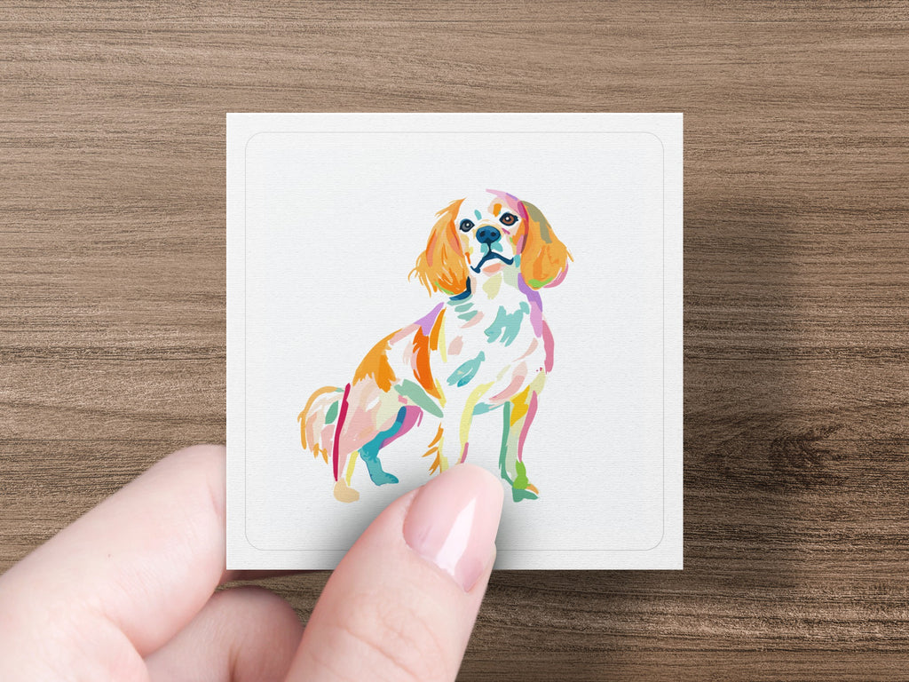 Colorful watercolor painting of a Cavalier King Charles Spaniel dog.