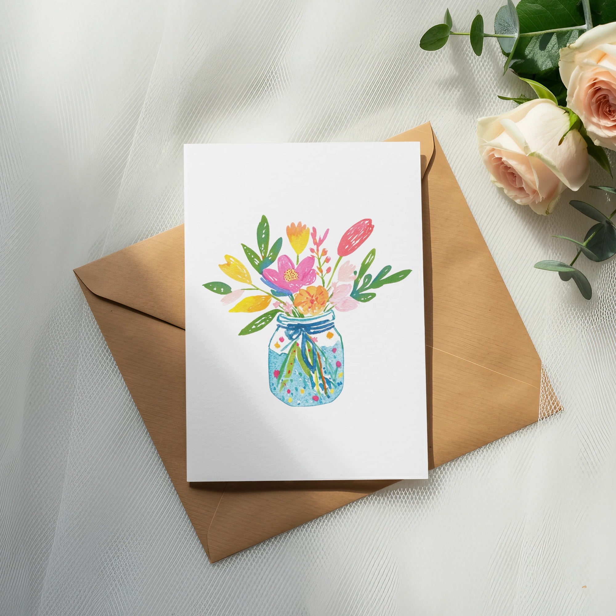 Watercolor illustration of a mason jar filled with colorful flowers on a white card.